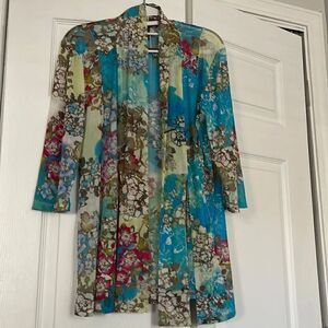 Pretty sheer floral jacket. Great to go over a sundress or use as a summer wrap.